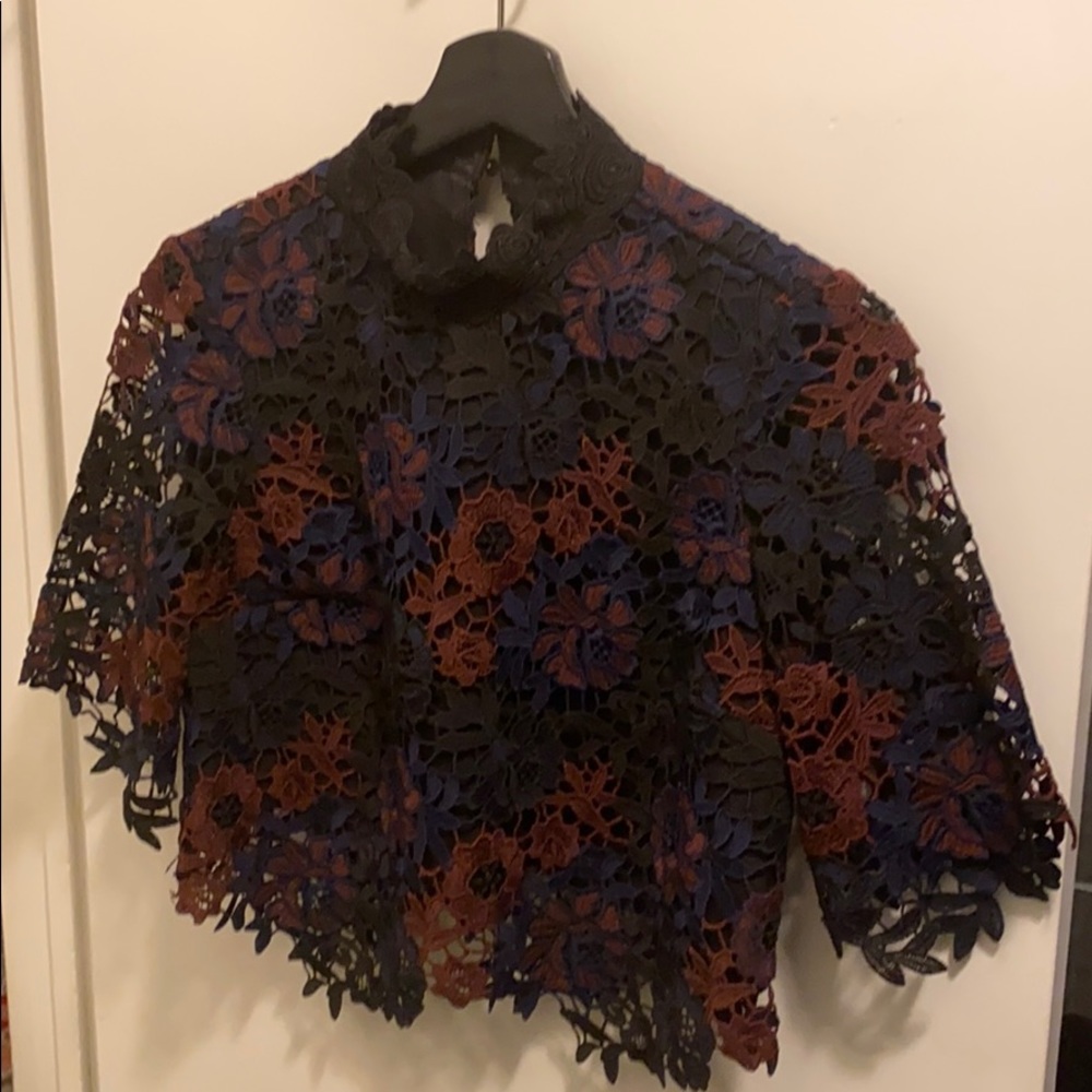 Laced multicolor fitted long sleeve crop top.